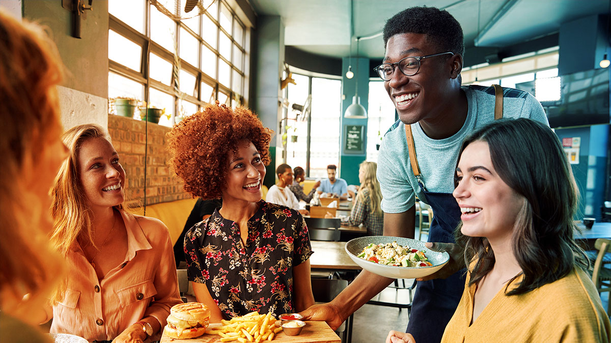 happy customers being served at a restaurant