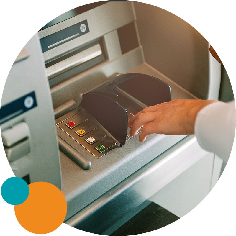 person at ATM machine