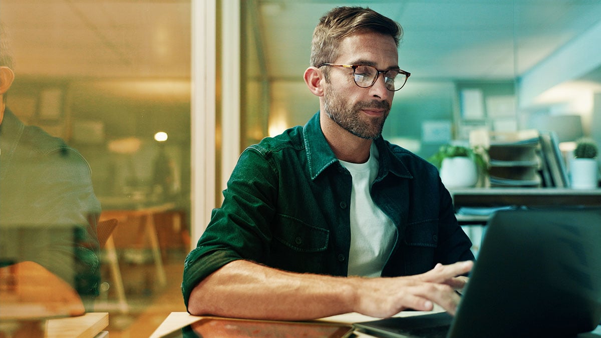 person typing on a laptop